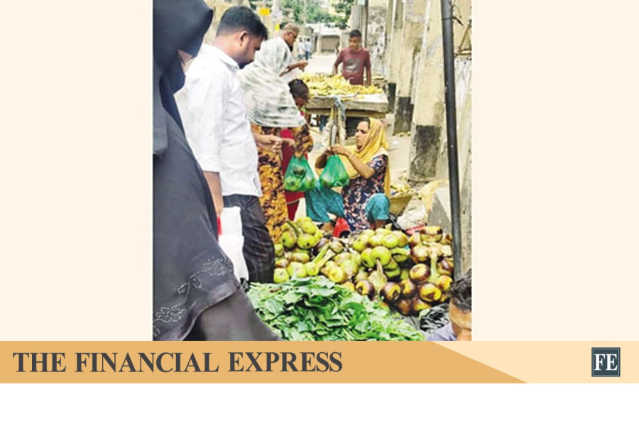 Low-income people earn a living with raw palm kernels in Chandpur
