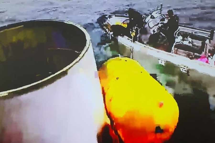A handout picture shows what is believed to be a part of a space launch vehicle that North Korea said crashed into the sea off the west coast of the divided peninsula of South Korea on Wednesday. Photo: Reuters