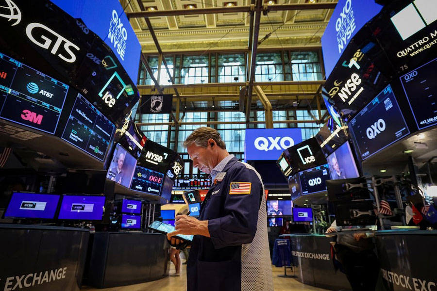 A trader works on the floor at the New York Stock Exchange (NYSE) in New York City, US, April 30, 2025.
