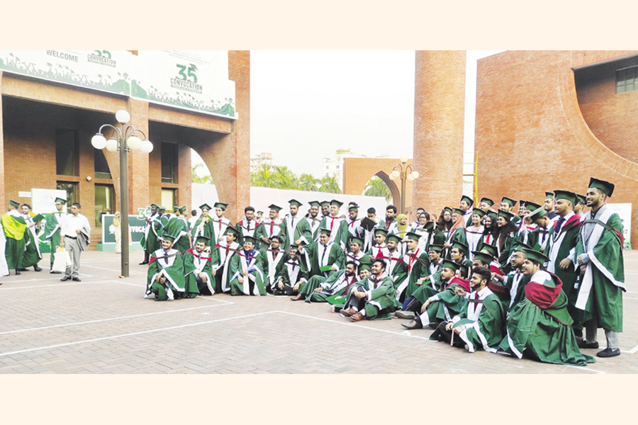Graduates posing for a photo during the convocation ceremony