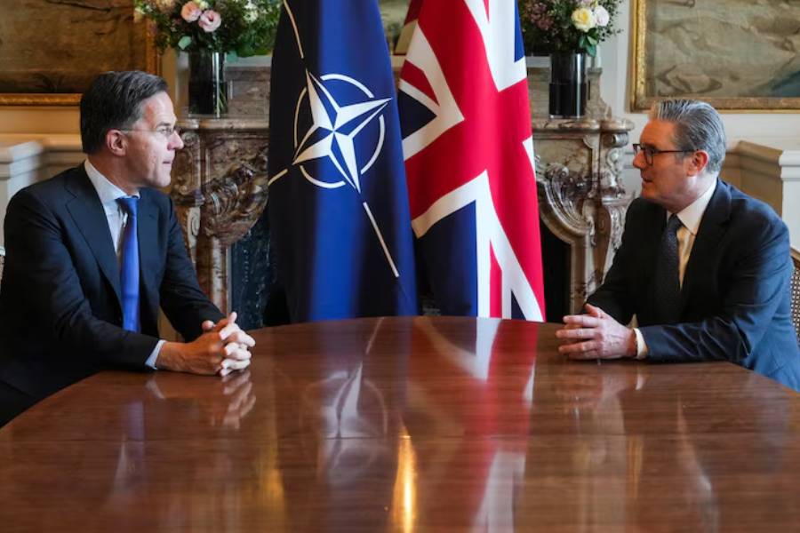 NATO Secretary General Mark Rutte meets Britain's Prime Minister Keir Starmer at the British embassy, on the sidelines of a summit for "Coalition of the Willing", in Paris, France March, 27, 2025.