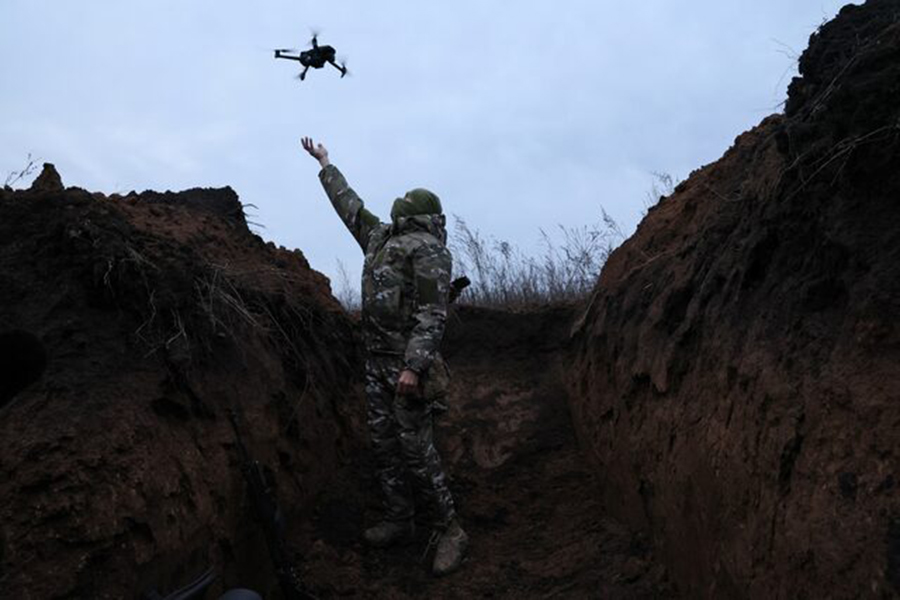 "Ghost", 24, a soldier with the 58th Independent Motorized Infantry Brigade of the Ukrainian Army, catches a drone while testing it so it can be used nearby, as Russia's invasion of Ukraine continues, near Bakhmut, Ukraine on November 25, 2022 — Reuters/File