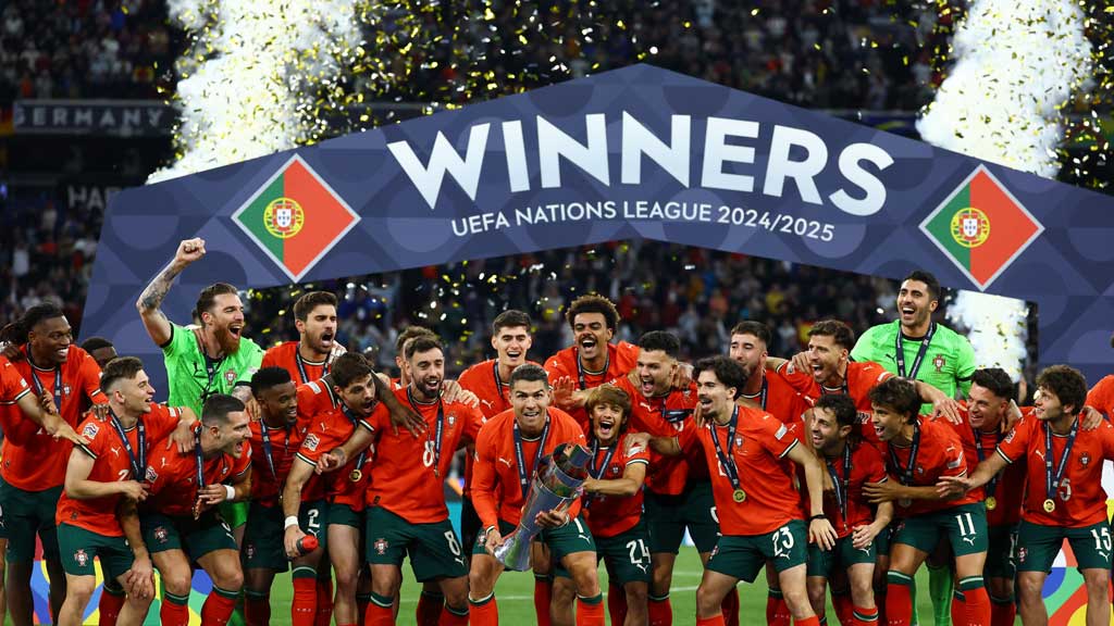 Portugal's Cristiano Ronaldo lifts the trophy as he celebrates with teammates after winning the Nations League — Reuters photo