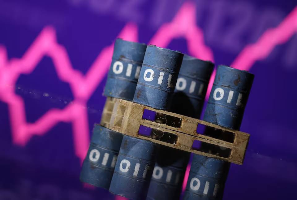 Miniatures of oil barrels and a rising stock graph are seen in this illustration taken January 15, 2024.