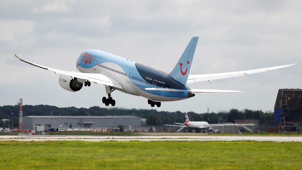 FILE PHOTO: A Boeing 787 of the travel company TUI takes off from the southern runway at Gatwick Airport in Crawley, Britain, Aug 25, 2021. REUTERS/Peter Nicholls/File Photo