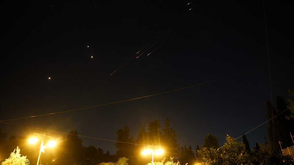 People celebrate on a street, after the Iran attack on Israel, in Tehran, Iran, June 13, 2025. Majid Asgaripour/WANA (West Asia News Agency) via REUTERS