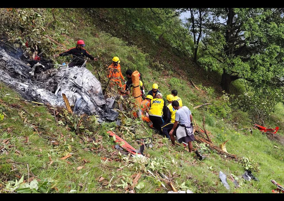 Members of rescue teams work at the site of a chopper crash in the Gaurikund area of the northern Indian state of Uttarakhand, India, June 15, 2025. State Disaster Response Force (SDRF) Uttarakhand/Handout via REUTERS