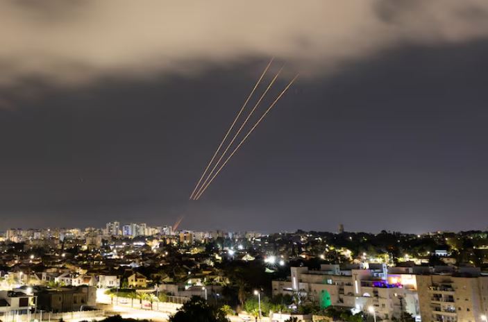 An anti-missile system operates after Iran launched drones and missiles toward Israel, as seen from Ashkelon, Israel, April 14. REUTERS/Amir Cohen