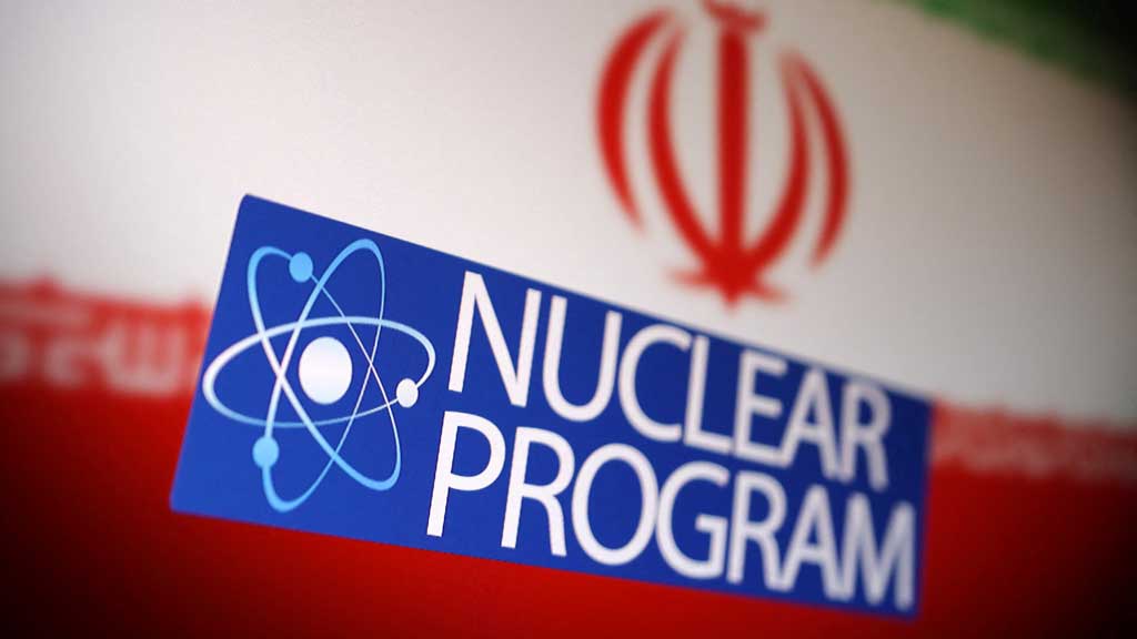 Iranian flag, atom symbol and words "Nuclear programme" are in this illustration taken June 16, 2025. REUTERS