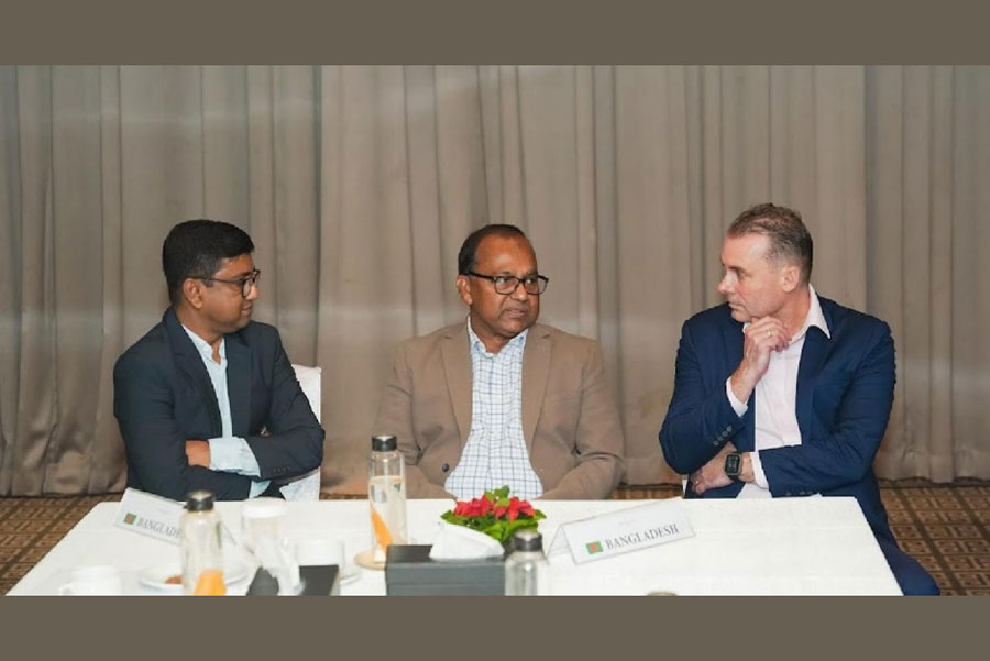 Simon-Thorsten Wiebusch, Cluster Head of Bayer CropScience for India, Bangladesh, and Sri Lanka (right), is discussing with Md. Fazlur Rahman, Chairman of BCIC and Bayer CropScience Ltd, Bangladesh (middle), and Zahidul Islam, Managing Director of Bayer CropScience Ltd (left)