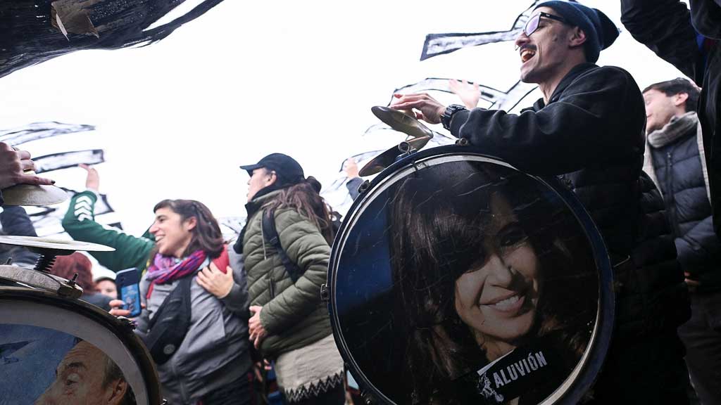 Supporters of Argentina's former President Cristina Fernandez de Kirchner cheer outside her house, after an Argentine judge approved her request to serve out her six-year prison sentence for corruption at home, in Buenos Aires, Argentina, June 18, 2025. REUTERS