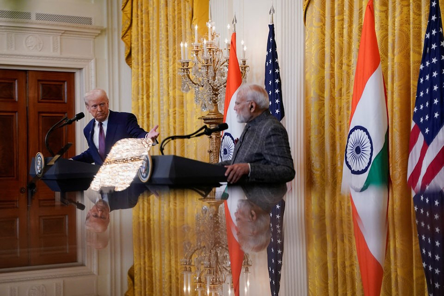 US President Donald Trump and Indian Prime Minister Narendra Modi are pictured in a mirror as they attend a joint press conference at the White House in Washington, DC, US, on February 13, 2025 — Reuters photo