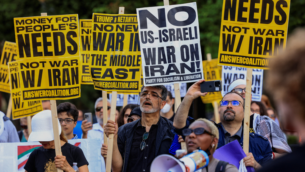 Anti-war activists protest outside the White House following the latest exchange of missile strikes between Iran and Israel, in Washington, DC, US, Jun 18, 2025. REUTERS/Kevin Mohatt