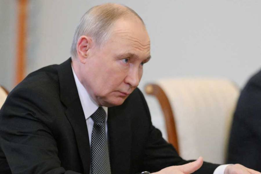 Russian President Vladimir Putin attends a meeting with President of the New Development Bank Dilma Rousseff on the sidelines of the St Petersburg International Economic Forum (SPIEF) at the Constantine Palace in Strelna in the suburb of Saint Petersburg, Russia Jun 18, 2025.