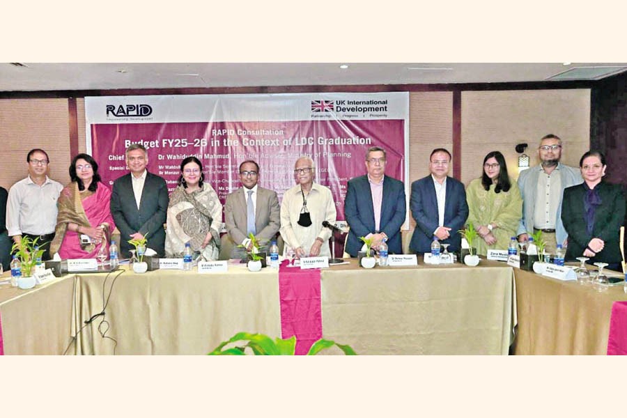 Planning Adviser Dr Wahiduddin Mahmud and other guests pose for photo at a discussion titled 'Budget FY2025-26 in the Context of LDC Graduation' organised by the Research and Policy Integration for Development (RAPID) at a city hotel on Saturday. Story on Page 8