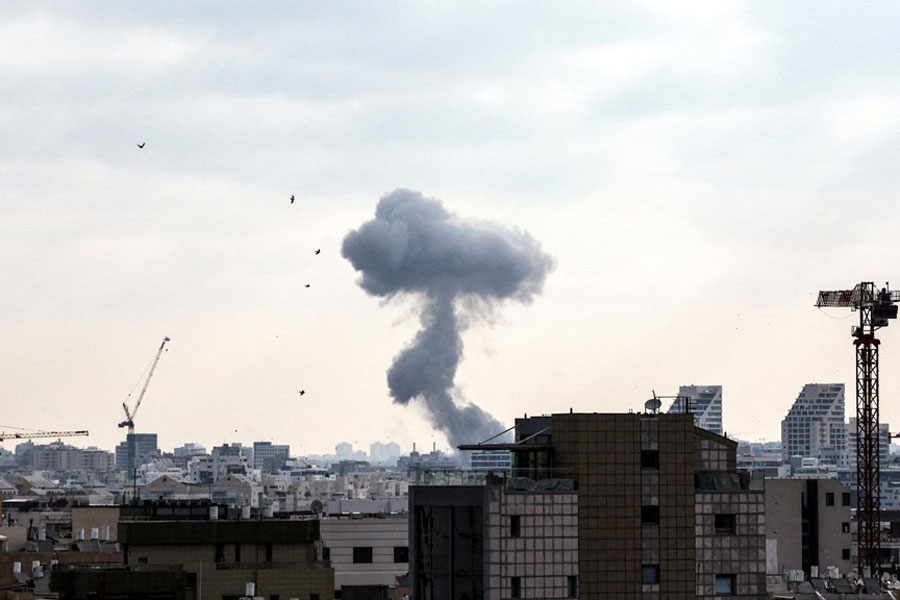Smoke can be seen during a missile attack from Iran on Israel, amid the Iran-Israel conflict, in Tel Aviv, Israel, June 22, 2025.