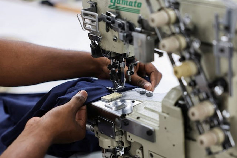 A worker uses a sewing machine at a garment factory in Tiruppur, in the Southern state of Tamil Nadu, India, April 22, 2025.