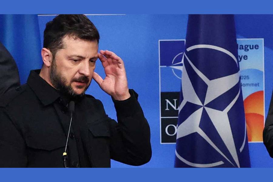 Ukraine’s President Volodymyr Zelensky reacts next to NATO Secretary General Mark Rutte (not pictured), European Commission President Ursula von der Leyen (not pictured) and European Council President Antonio Costa (not pictured) on the first day of a NATO summit in The Hague, Netherlands June 24, 2025.