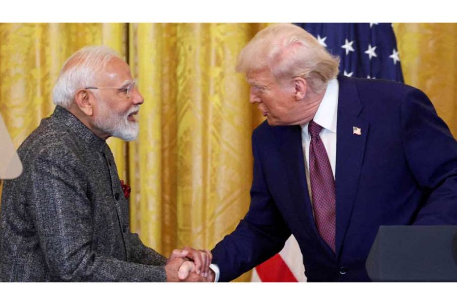 President Donald Trump and Indian Prime Minister Narendra Modi shake hands as they attend a joint press conference at the White House in Washington, DC, US, Feb 13, 2025.