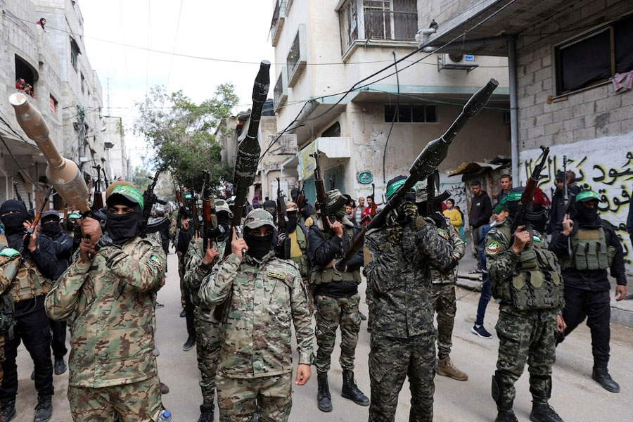 Hamas militants carry grenade launchers at the funeral of Marwan Issa, a senior Hamas deputy military commander who was killed in an Israeli airstrike during the conflict between Israel and Hamas, amid a ceasefire between Israel and Hamas, in the central Gaza Strip, February 7, 2025.