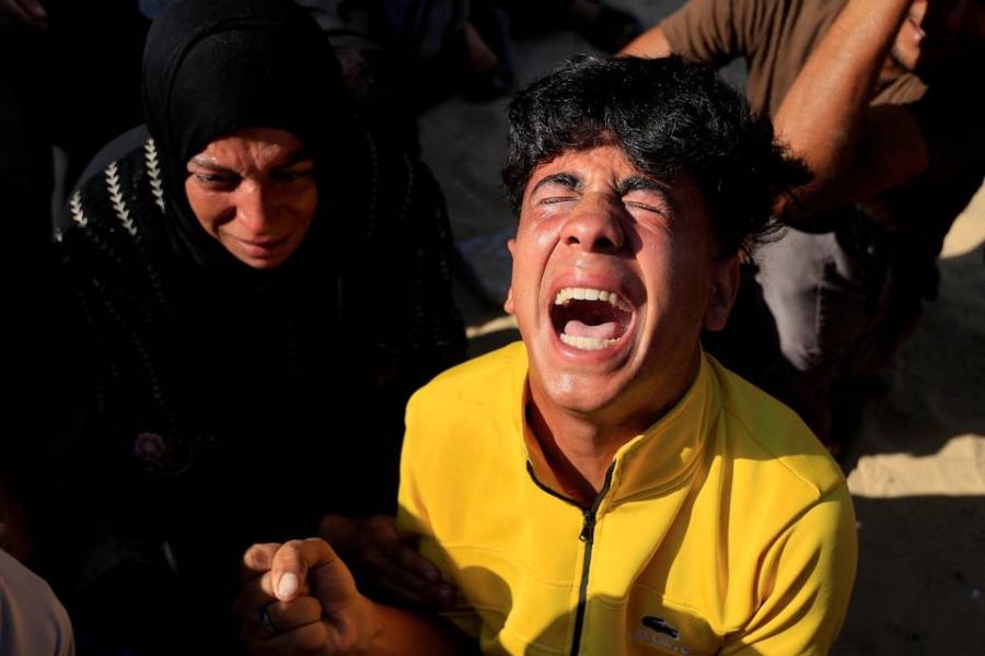 Mourners react during the funeral of Palestinians killed in an overnight Israeli strike on a tent, according to Gaza's health ministry, at Nasser Hospital in Khan Younis, southern Gaza Strip, June 29, 2025.
