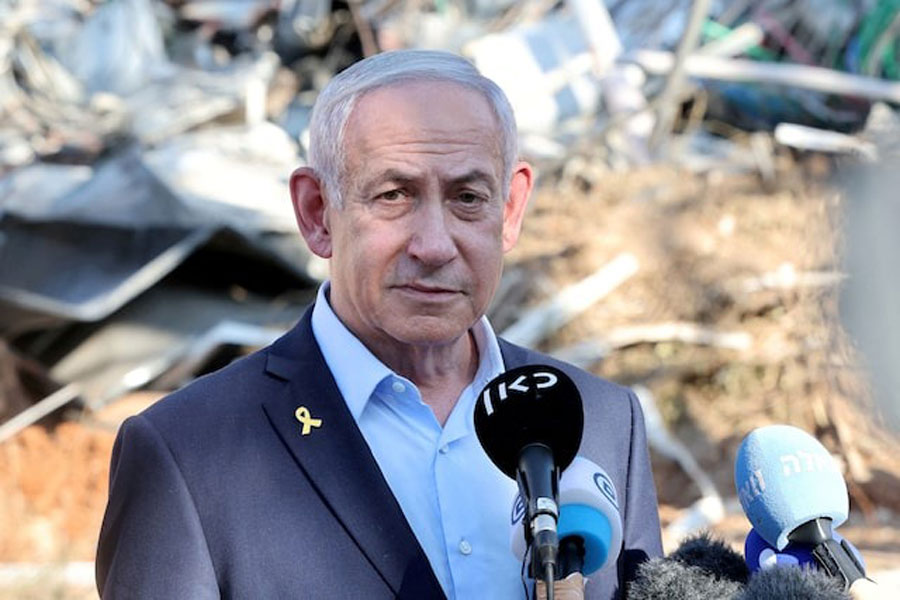 Israel's Prime Minister Benjamin Netanyahu gives a statement during a visit to the site of the Weizmann Institute of Science, which was hit by an Iranian missile barrage, in the central city of Rehovot, Israel June 20, 2025.