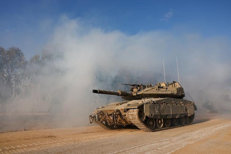 An Israeli tank manoeuvres near the Israel-Gaza border, amid the ongoing conflict between Israel and the Palestinian Islamist group Hamas, in Israel, April 10, 2024.