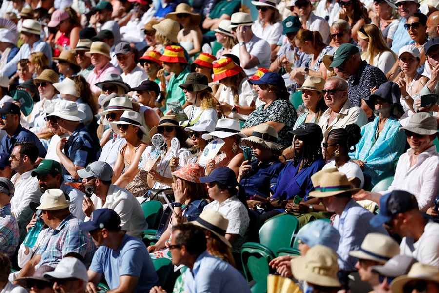 Spectators try to cool down in the stands of Centre Court during the first-round match between Spain’s Carlos Alcaraz and Italy’s Fabio Fognini at Wimbledon, All England Lawn Tennis and Croquet Club, London, Britain on June 30, 2025 — Reuters photo