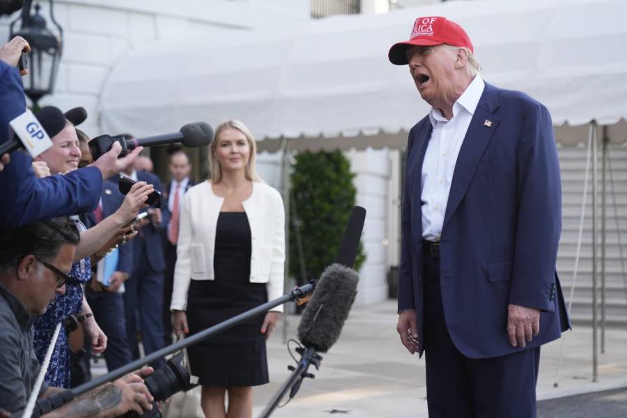 President Donald Trump speaks to the media before walking across the South Lawn of the White House to board Marine One en route to Joint Base Andrews, Md., and on to Florida, Tuesday, July 1, 2025, in Washington.