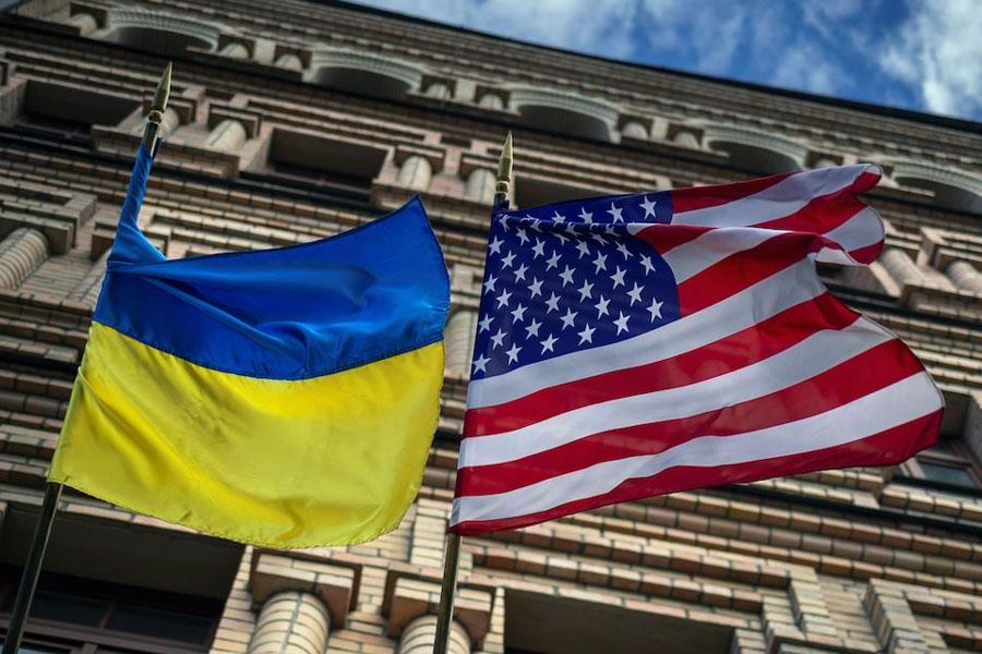 The Ukrainian and US national flags fly outside a building, amid Russia’s attack on Ukraine, in Kyiv, Ukraine, May 12, 2025.