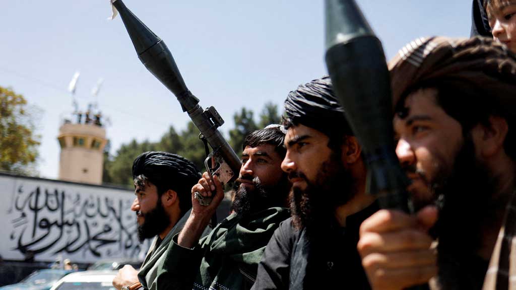 Taliban soldiers celebrate on the second anniversary of the fall of Kabul on a street near the US embassy in Kabul, Afghanistan, August 15, 2023. REUTERS