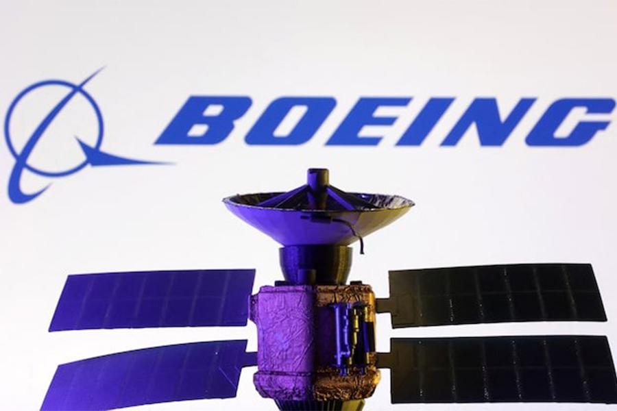 Boeing logo and miniature satellite model are seen in this illustration taken on March 10, 2025 — Reuters photo