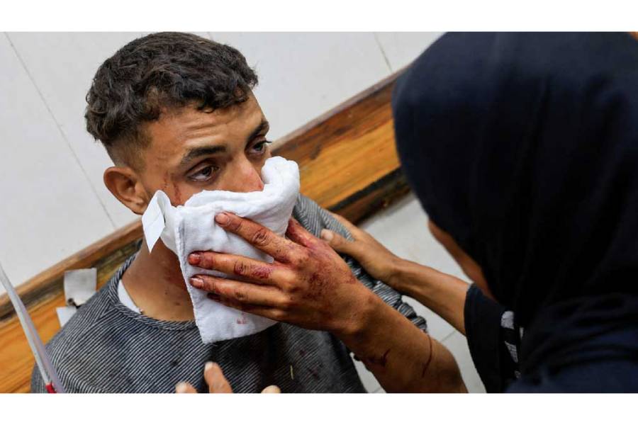 A Palestinian, wounded by Israeli fire while seeking aid on Friday, according to medics, receives treatment at Nasser Hospital in Khan Younis, southern Gaza Strip, Jul 4, 2025.
