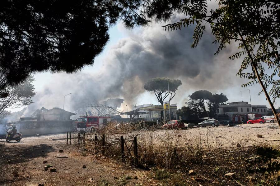 A huge cloud of smoke rises after a gas station exploded on the outskirts of Rome, Italy, July 4, 2025.
