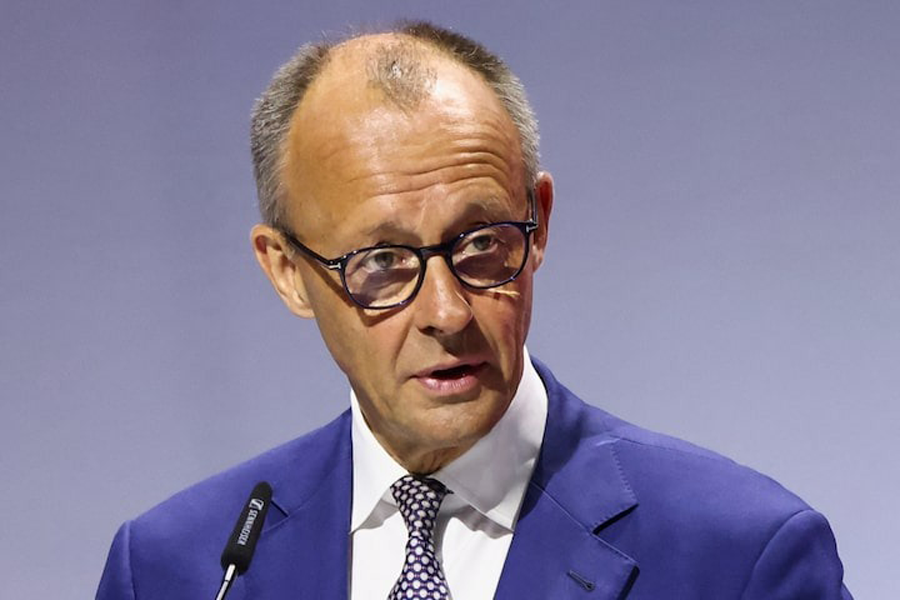 German Chancellor Friedrich Merz attends the BVR banking conference in Berlin, Germany, July 3, 2025.