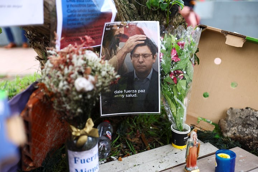 A picture of Colombian Senator Miguel Uribe Turbay of the opposition Democratic Center party is seen at a tribute at a place where he was shot during a campaign event, in Bogota, Colombia, June 12, 2025.