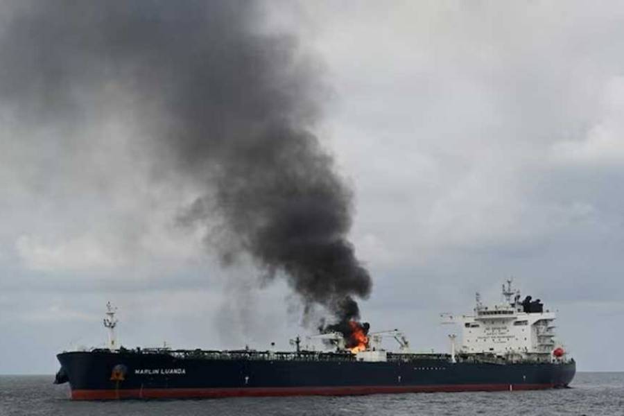 Smoke rises from Marlin Luanda, merchant vessel, after the vessel was struck by a Houthi anti-ship missile, at the location given as Gulf of Aden, in this handout picture released Jan 27, 2024.