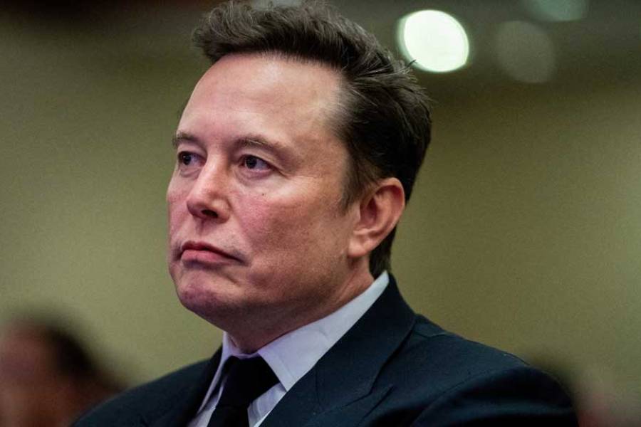 Tesla CEO and X owner Elon Musk listens as US President-elect Donald Trump speaks during a meeting with House Republicans at the Hyatt Regency hotel in Washington, DC, US on Nov 13, 2024.