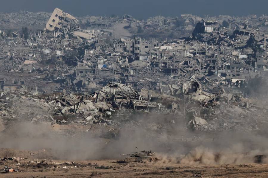 An Israeli tank maneuvers in Gaza, as seen from the Israeli side of the border, July 6, 2025.
