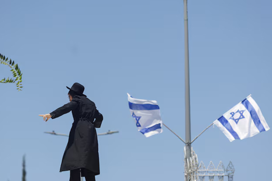 An ultra-Orthodox Jewish man gestures during a demonstration after the Supreme Court ruled in June that the defence ministry could no longer grant blanket exemptions to Jewish seminary students from military conscription, at Tel HaShomer recruitment base, in Ramat Gan, Israel on August 5, 2024 — Reuters photo
