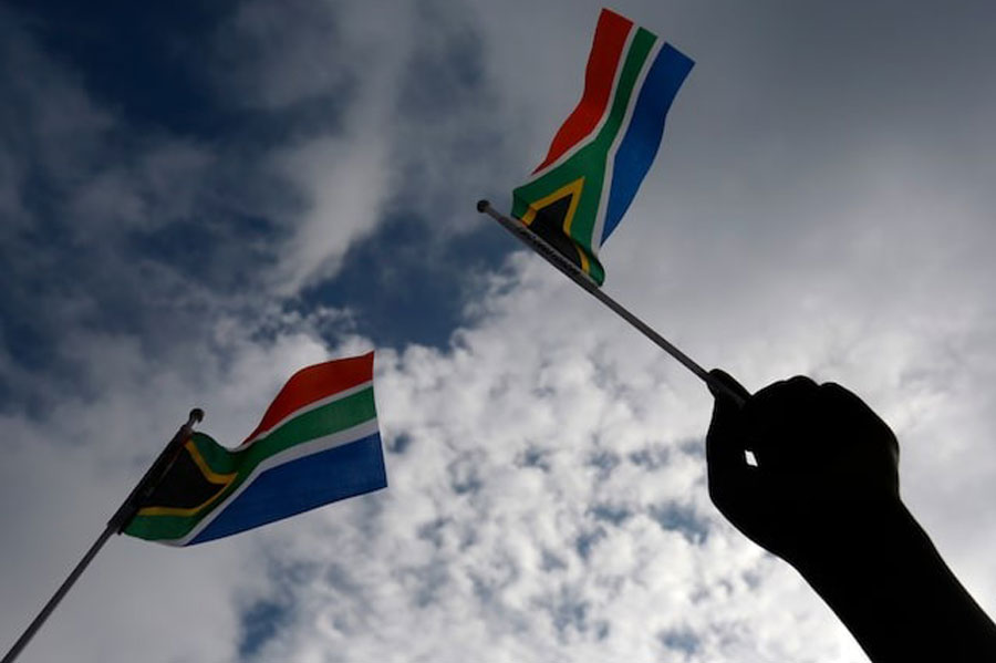 South African flags are seen in Pretoria, South Africa, December 11, 2013.