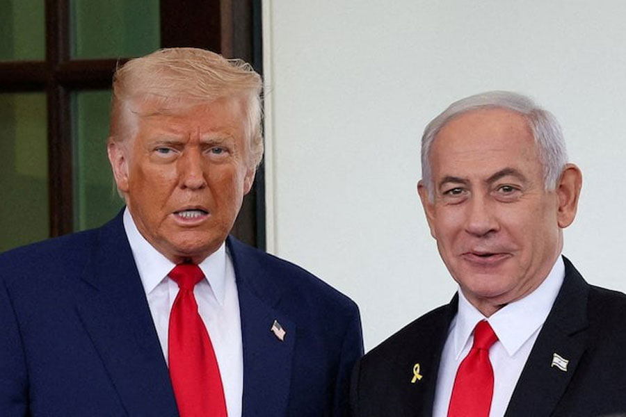 US President Donald Trump welcomes Israeli Prime Minister Benjamin Netanyahu at the entrance of the White House in Washington, DC, US, April 7, 2025.