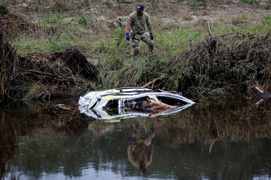 A law enforcement member works in recovery operations following flooding on the Guadalupe River, in Camp Mystic, Hunt, Texas, US on July 7, 2025 — Reuters photo