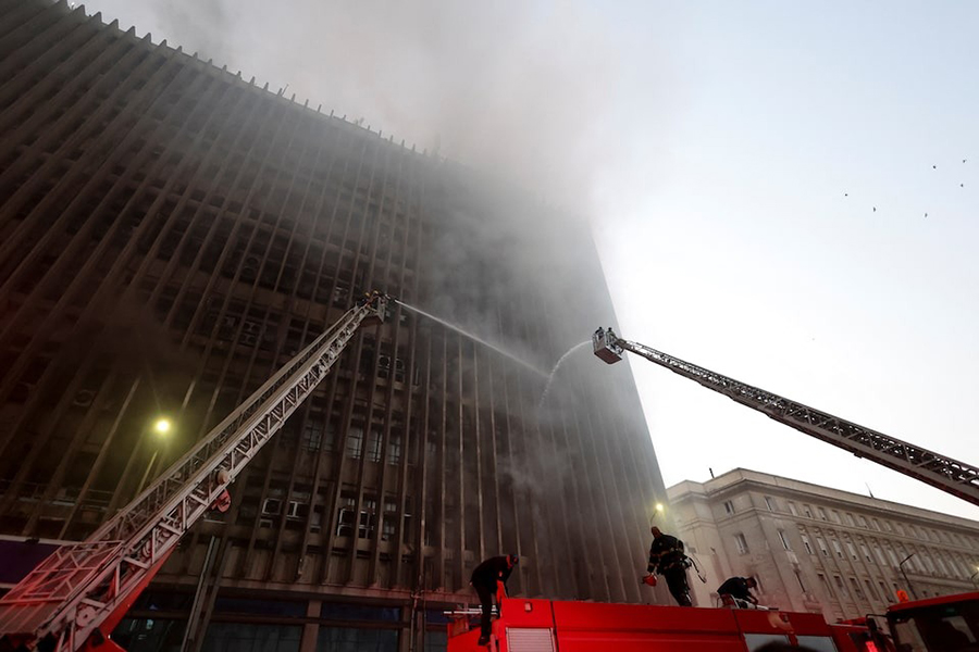Firefighters work to extinguish a fire that erupted in a telecommunications building in the Ramses district of downtown Cairo, Egypt on July 7, 2025 — Reuters photo