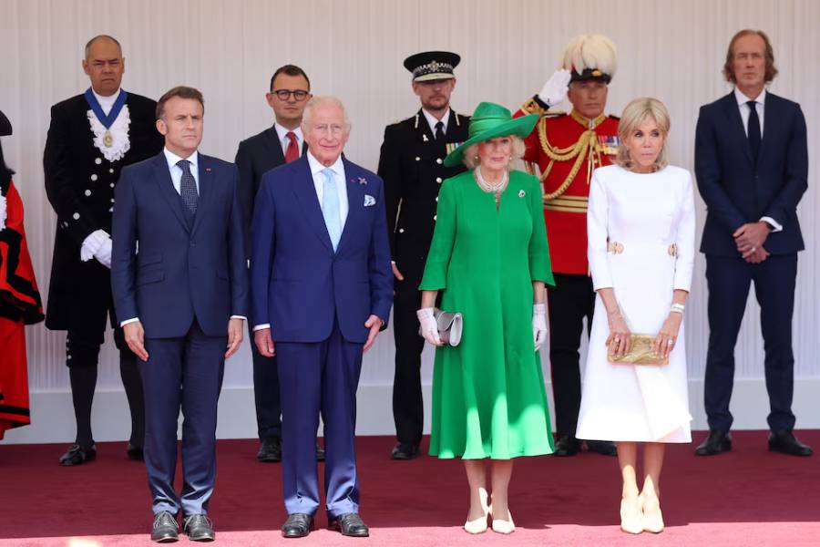 President of France, Emmanuel Macron, King Charles III, Queen Camilla and Brigitte Macron on the Royal Dais at Datchet Road on July 08, 2025 in Windsor, England.