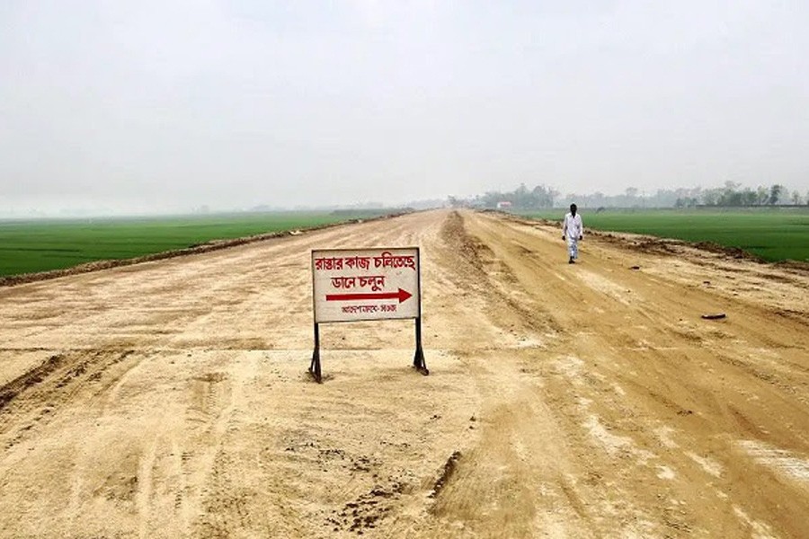 A view of the under-construction Kumargaon-Badaghat-Airport road in Sylhet