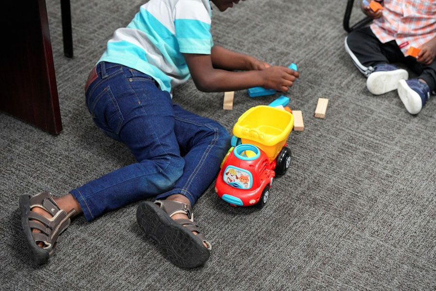 Children play with toys at the St. Vincent de Paul Society in Springfield, Ohio, US, July 2, 2025.