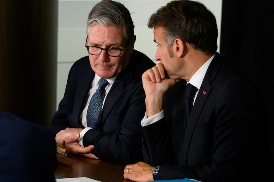 British Prime Minister Keir Starmer and French President Emmanuel Macron host a meeting of the Coalition of the Willing during a joint military visit to the Northwood Headquarters, on July 10, 2025 in London, England.