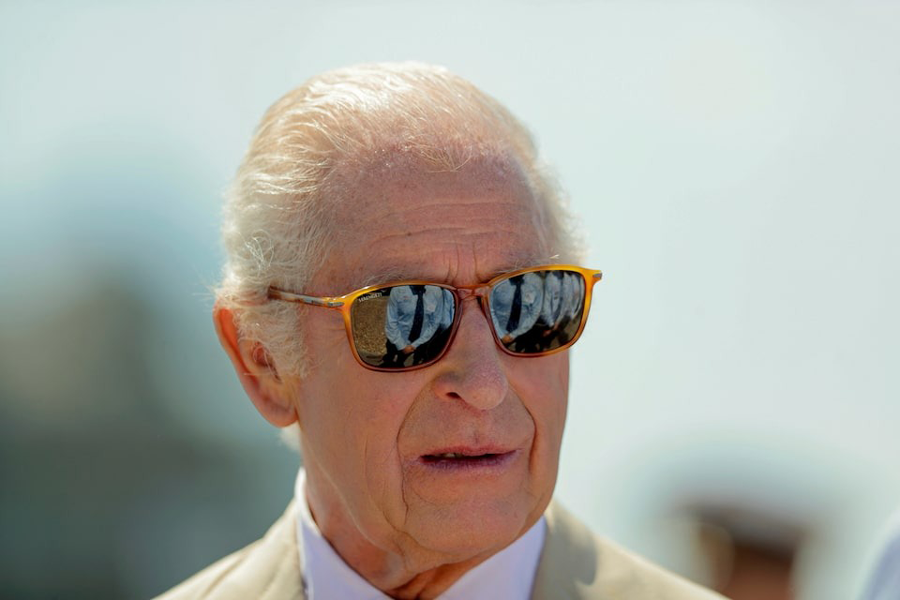King Charles III meets volunteers during his visit at the Walmer R.N.L.I. Lifeboat Station on July 10, 2025 in Deal, England.