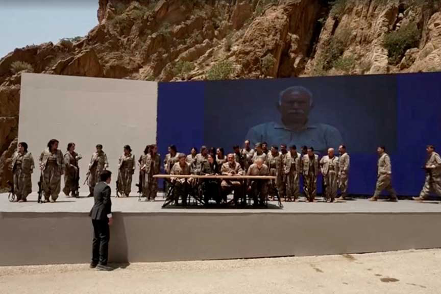 Armed PKK fighters arrive ahead of a disarming ceremony in Sulaimaniya, Iraq, Jul 11, 2025, in this screengrab obtained from a handout video.